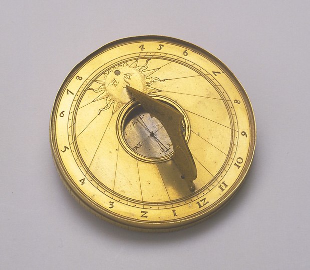 Horizontal sundial with central compass and folding gnomon, 16th century.