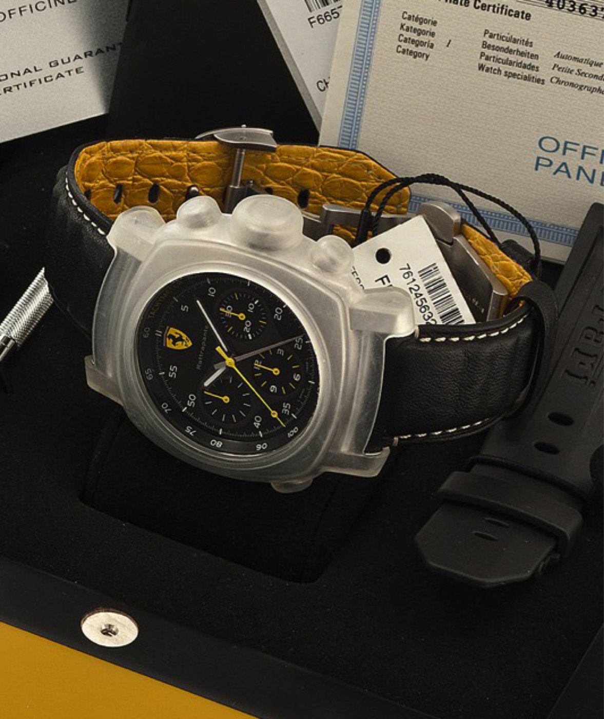 Officine Panerai Ferrari Scuderia Rattrappante Ref. FER 10, showing the watch, its protective cover, and accompanying box and documentation.