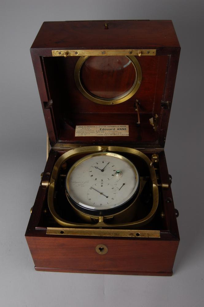 Overall view of the Breguet & Fils marine chronometer gimballed in its opened mahogany box