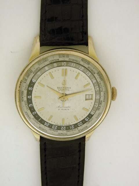 Front view of the Breitling Unitime Automatic showing the world-time bezel and map-dial.