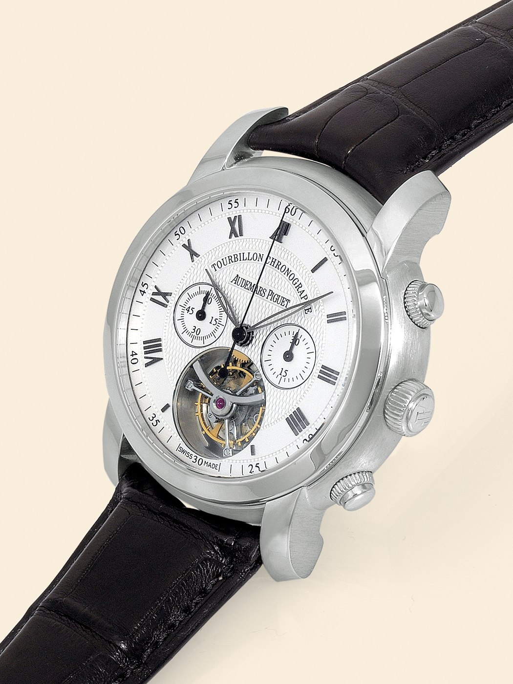 Front view of the Audemars Piguet Jules Audemars Tourbillon Chronograph showing the silver guilloché dial, tourbillon aperture at 6 o'clock, and chronograph registers.