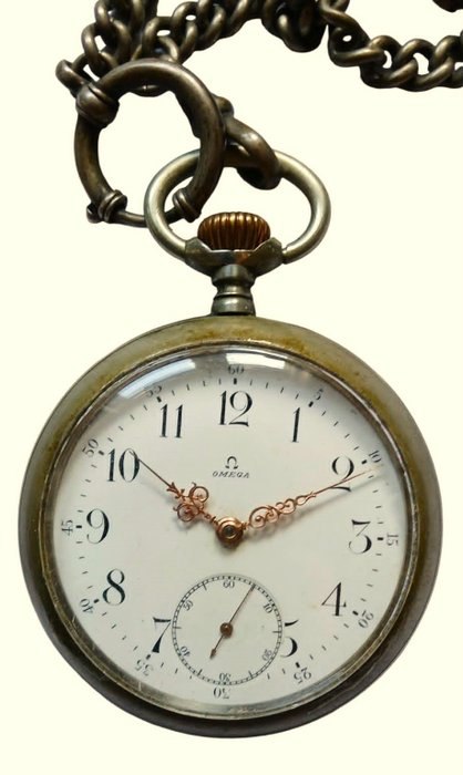 Front view showing the white dial, Arabic numerals, ornate hands, and curb link pocket watch chain