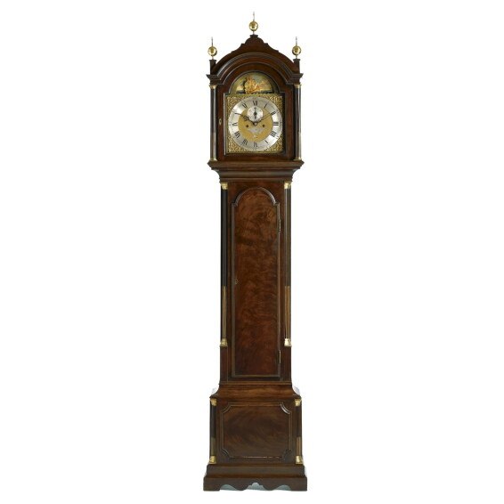 Full frontal view of the English mahogany longcase clock with ships automaton