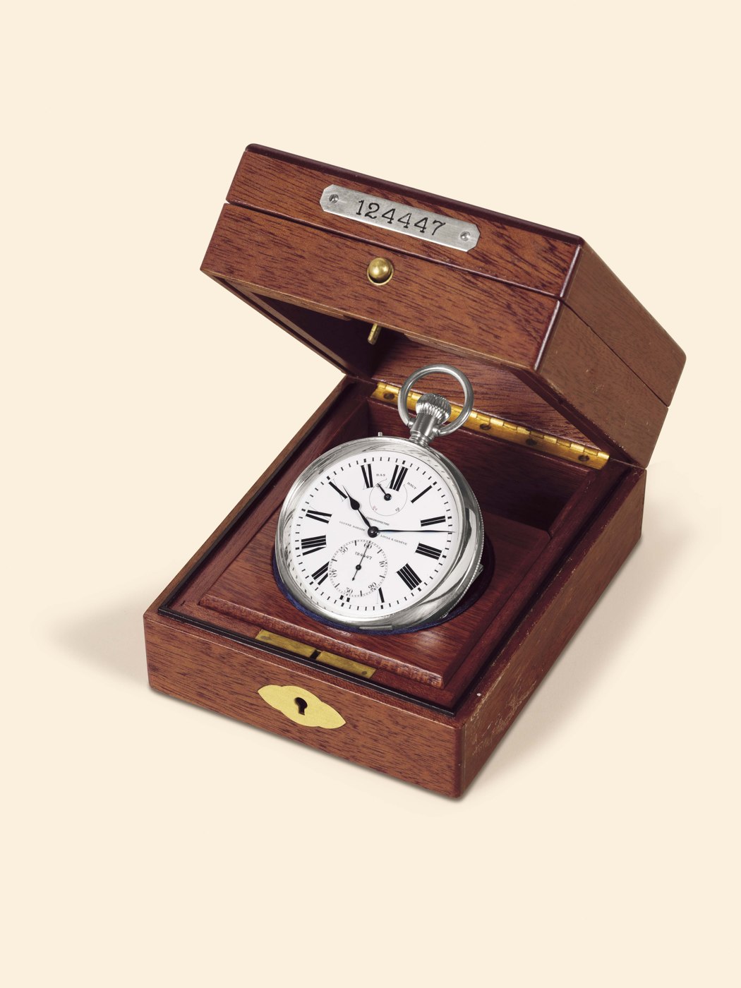 Ulysse Nardin stainless steel deck chronometer in its original wooden presentation box, showing the dial with up-and-down indicator.