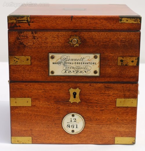 Front view of the closed three-tier rosewood box of Sir John Bennett marine chronometer no. 12861 showing brass mountings and plaques
