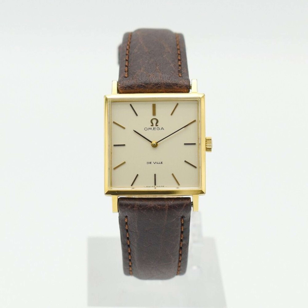 Front view of the Omega De Ville ref. 111.071 square wristwatch on a brown leather strap
