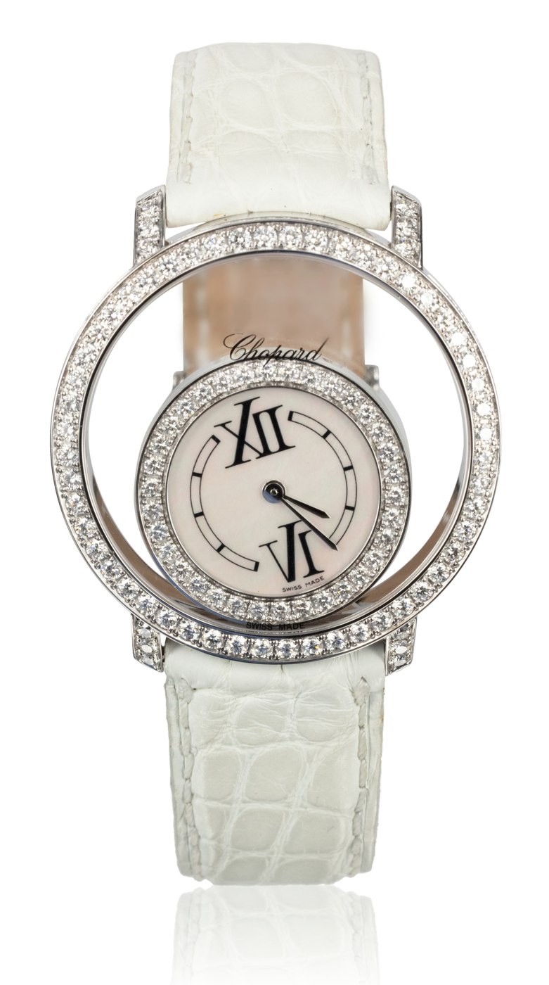 Front view of the Chopard Happy Diamonds – Happy Time wristwatch showing the dial, diamond-set bezel, and white leather strap.