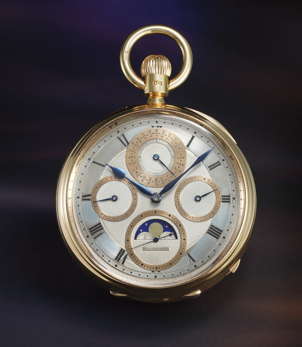 Dial and case front of the Charles Frodsham yellow gold open face pocket watch