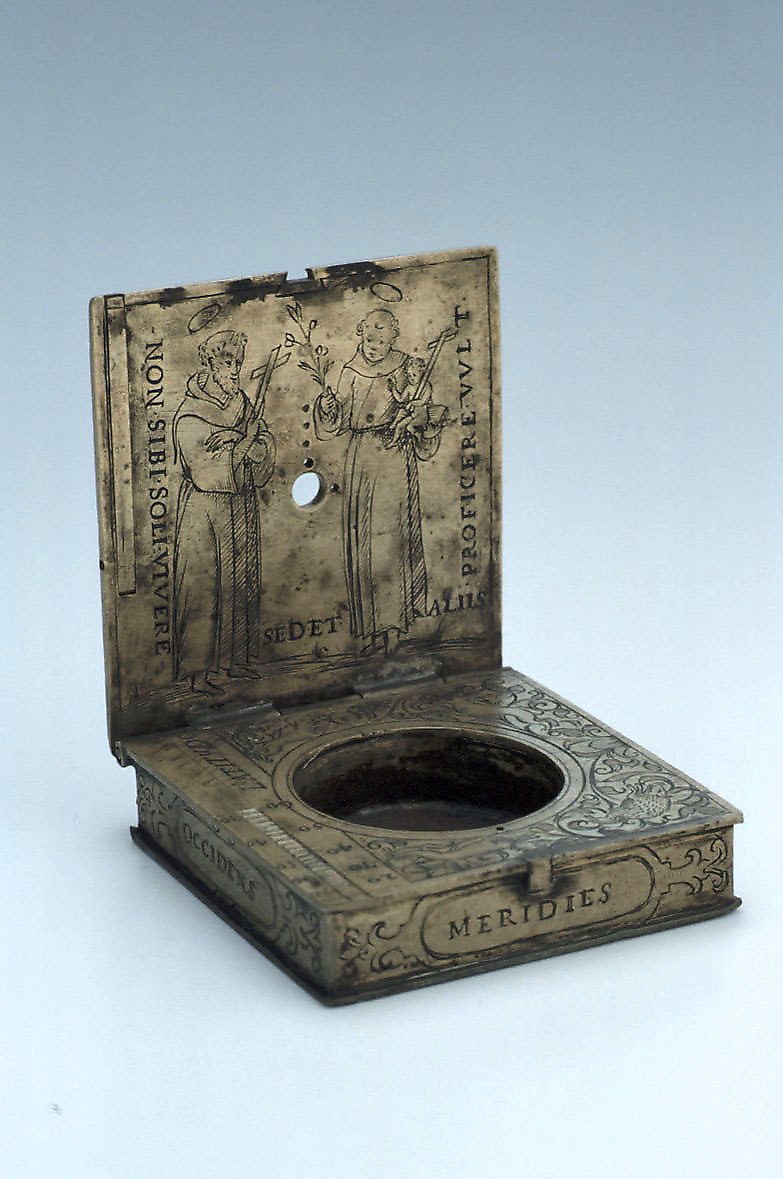 Equinoctial sundial by Hieronymus de Arresse, 1598, showing the open lid with religious engravings.