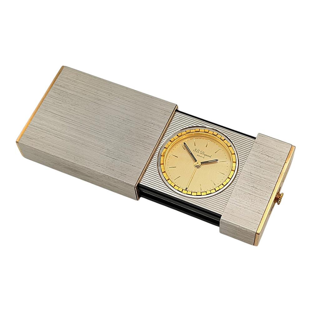 S.T. Dupont Paris travel alarm clock in the open position.