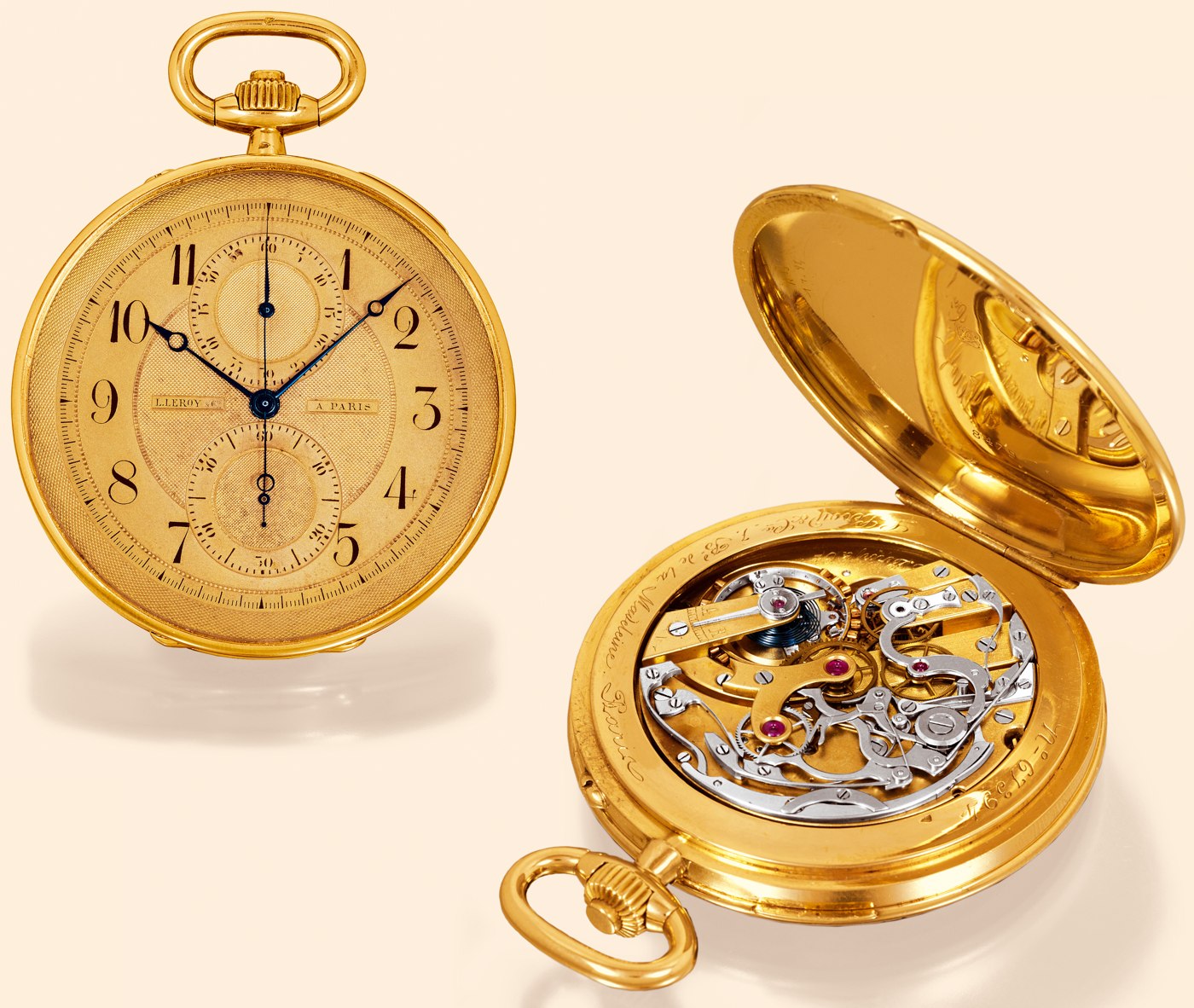 View of the gold engine-turned dial and the 19-ligne gilt brass movement of the L. Leroy & Cie. pocket watch.