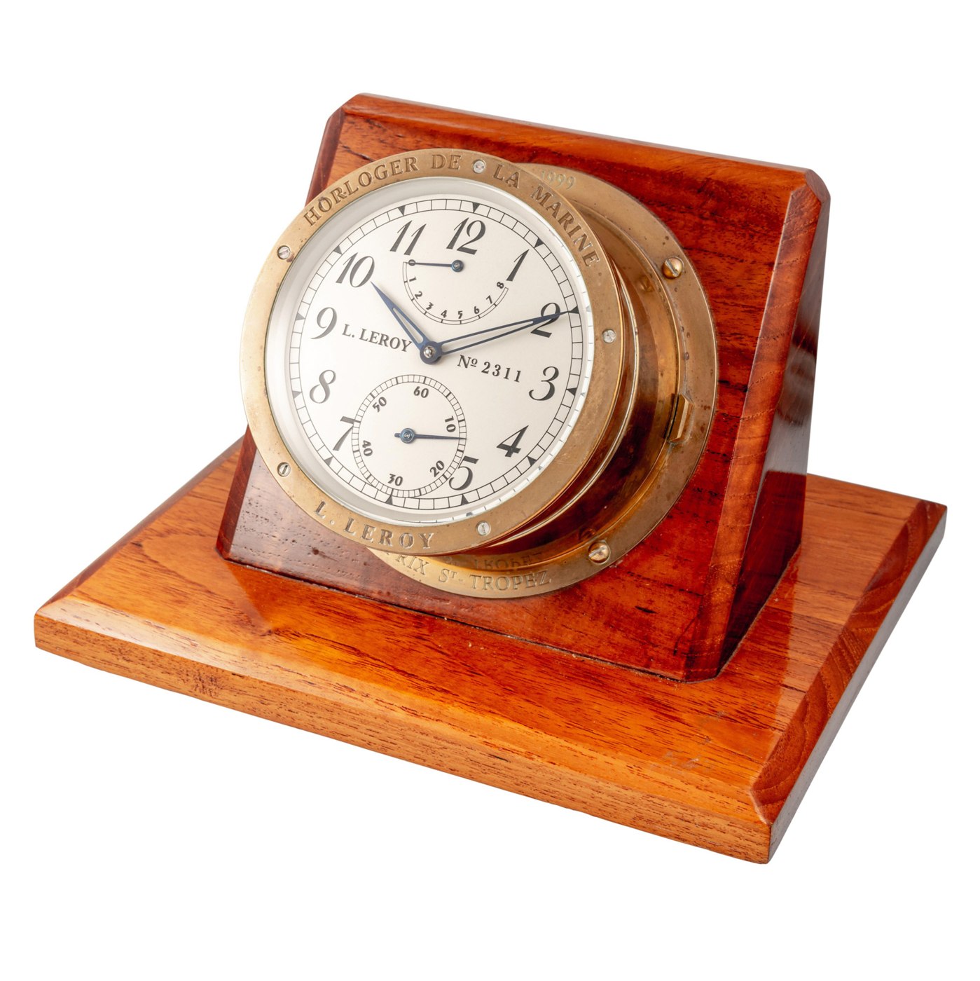 L. Leroy & Cie marine table clock with brass barrel on a mahogany base.