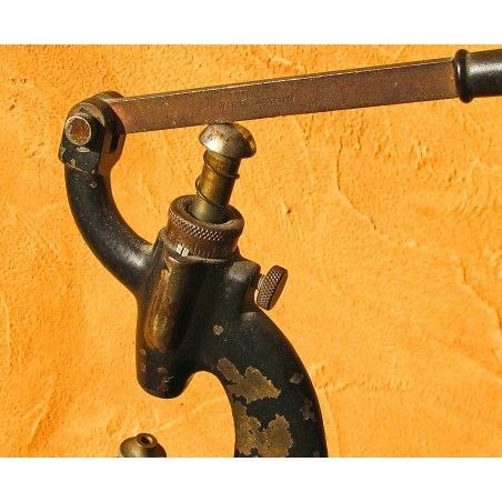 Upper portion of the La Favorite potence showing the lever arm, spring-loaded spindle, and cast frame