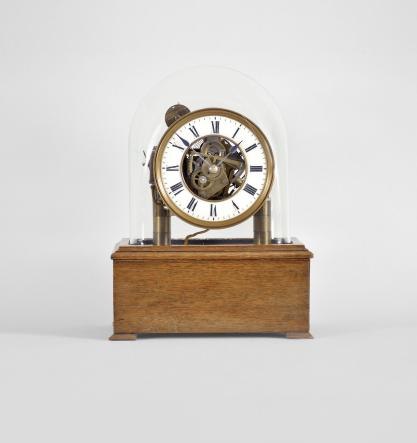 Eureka Clock Co. Ltd. striking electromagnetic '1000 day' mantel clock under glass dome, circa 1910