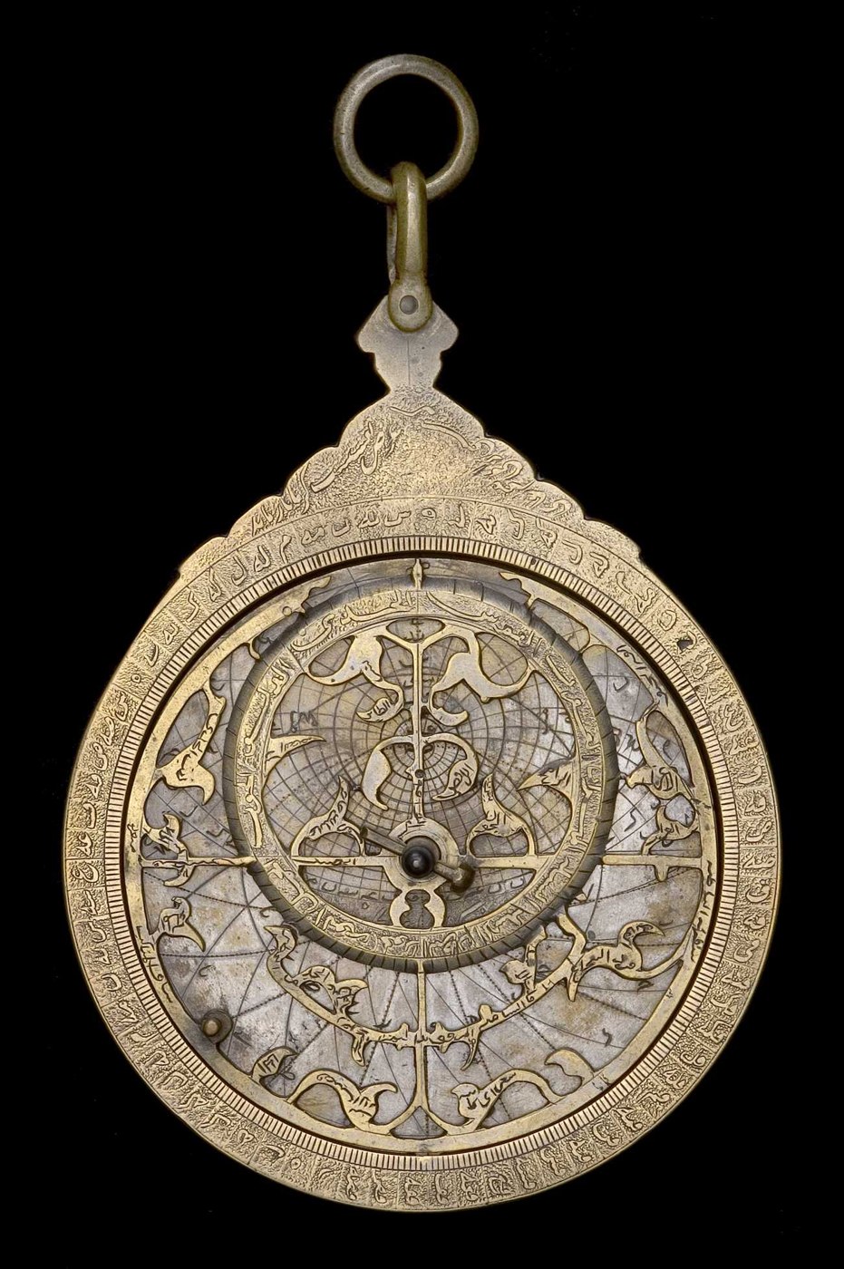 Front view of the astrolabe showing the rete, throne, and Arabic inscriptions on the limb.