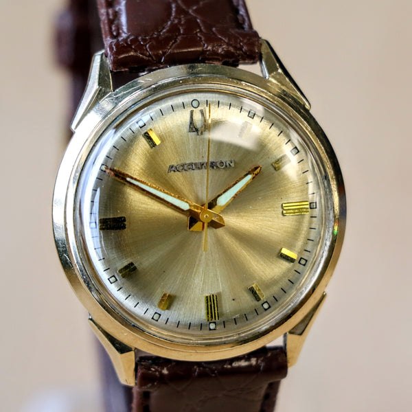 Bulova Accutron '412' wristwatch with sunburst champagne dial and gold-filled case