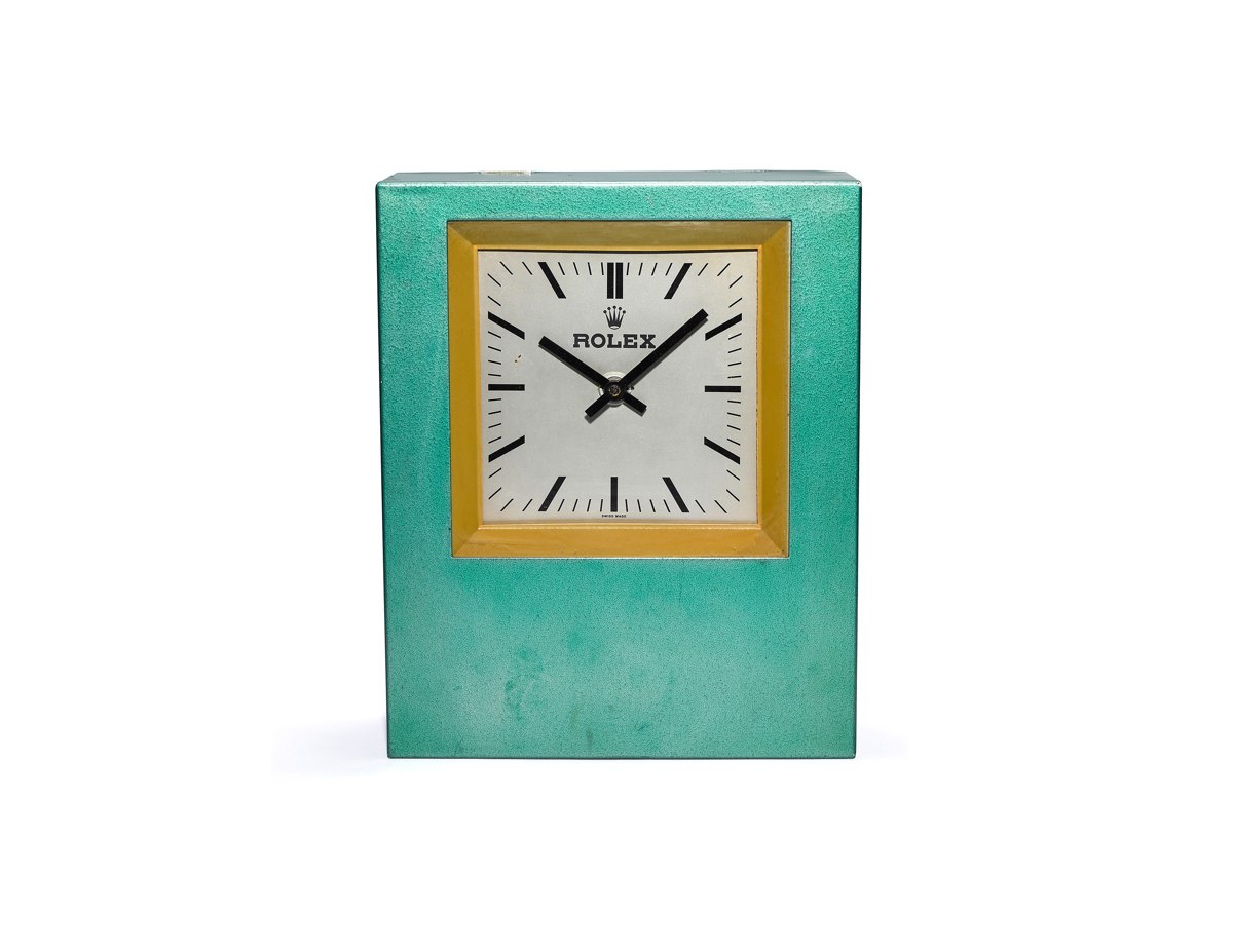 Front view of the Rolex rectangular wall clock with green case and silvered dial
