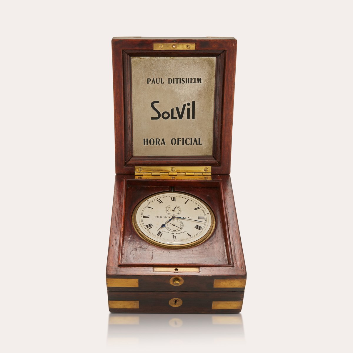 Front view of the Paul Ditisheim deck timepiece in an open Brazilian rosewood presentation box
