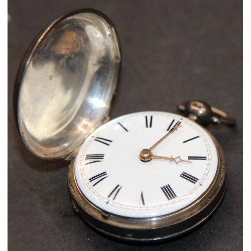 Front view of open full hunter pocket watch displaying white enamel dial and hands