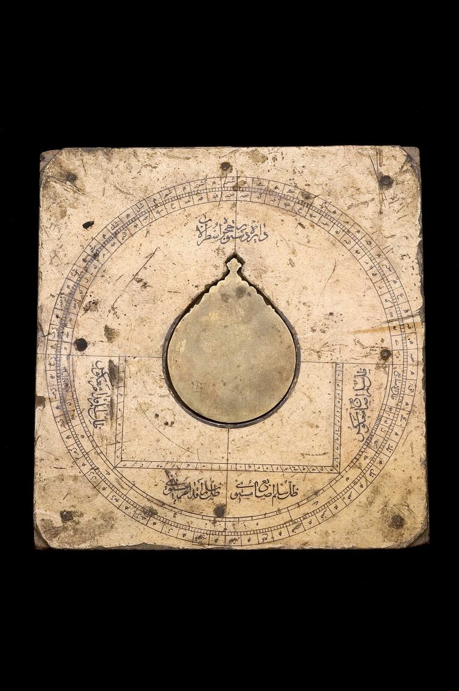 Wooden astrolabe template (dastūr) with brass blank, 18th century, Persia.