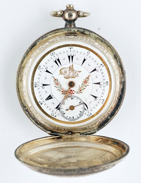 Front view of open hunting case displaying the white dial with Ottoman numerals and tughra