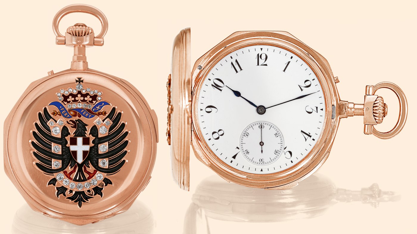 Obverse showing the diamond-set coat of arms on the hunting cover, and reverse showing the open dial with blued steel hands.