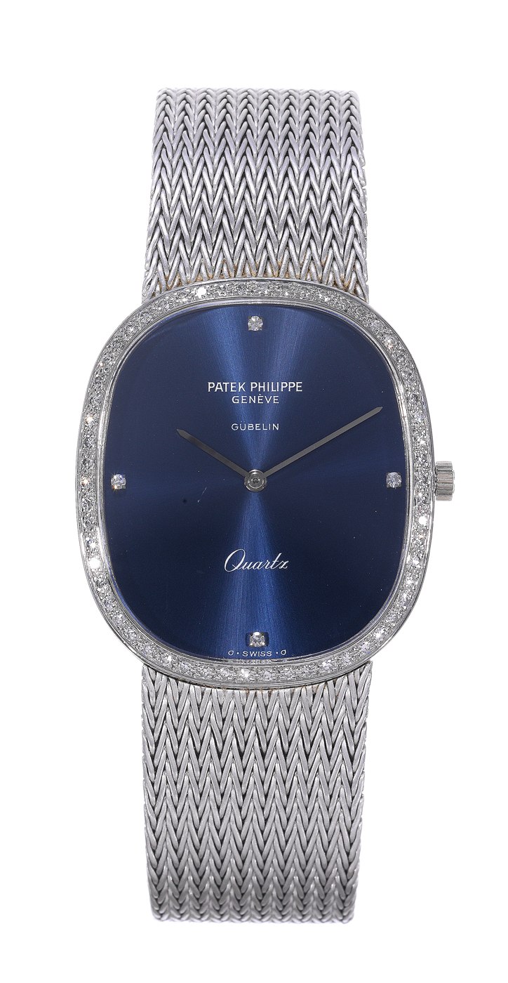 The Patek Philippe Ellipse Ref. 3875/1 with satine blue dial and integrated woven white gold bracelet.