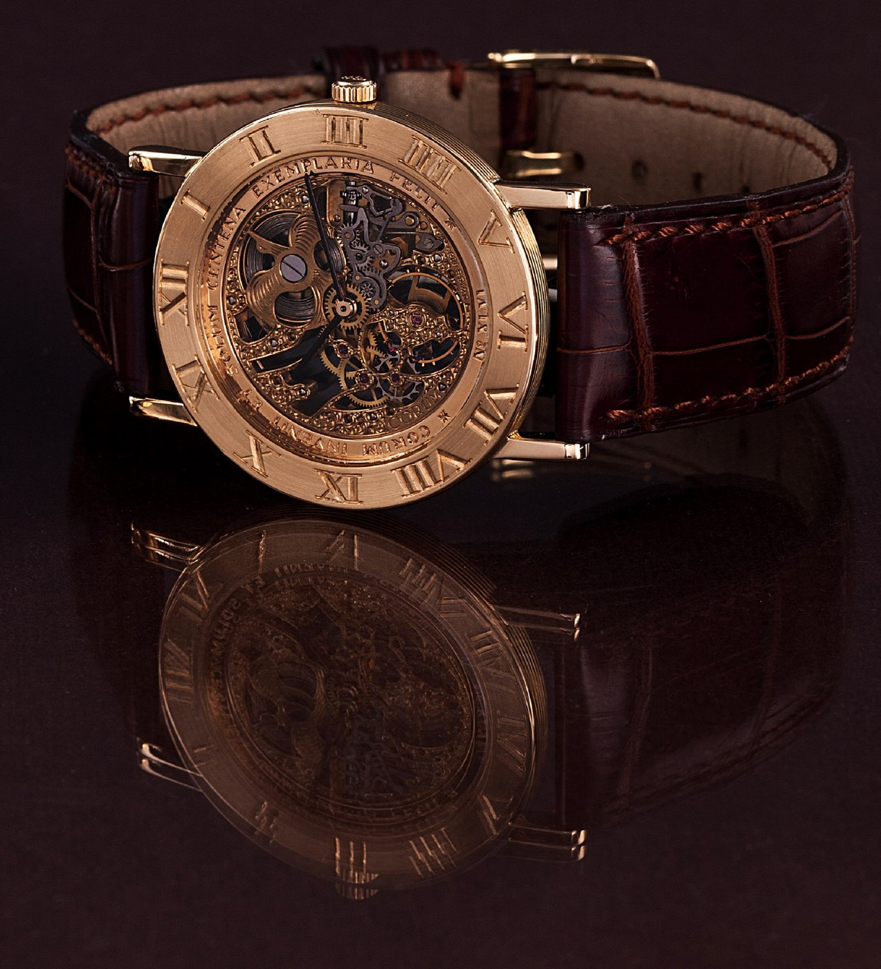 Corum Romulus skeletonized wristwatch showing the engraved bezel and exposed movement.