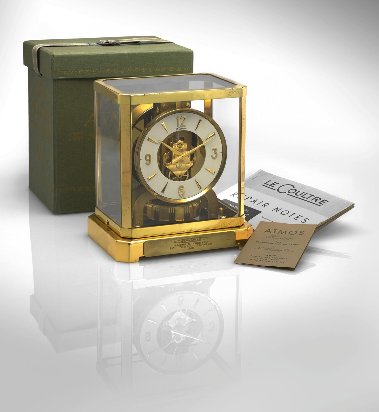 Jaeger-LeCoultre Atmos clock shown with its original box and documentation.