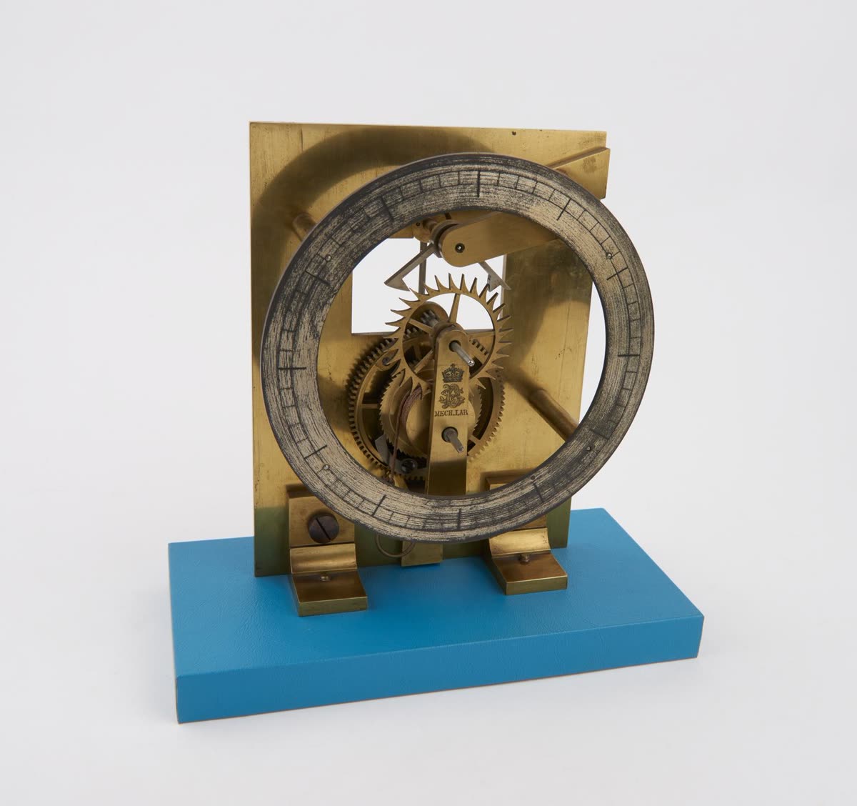 Front view of the recoil escapement clock demonstration model mounted on a blue support base