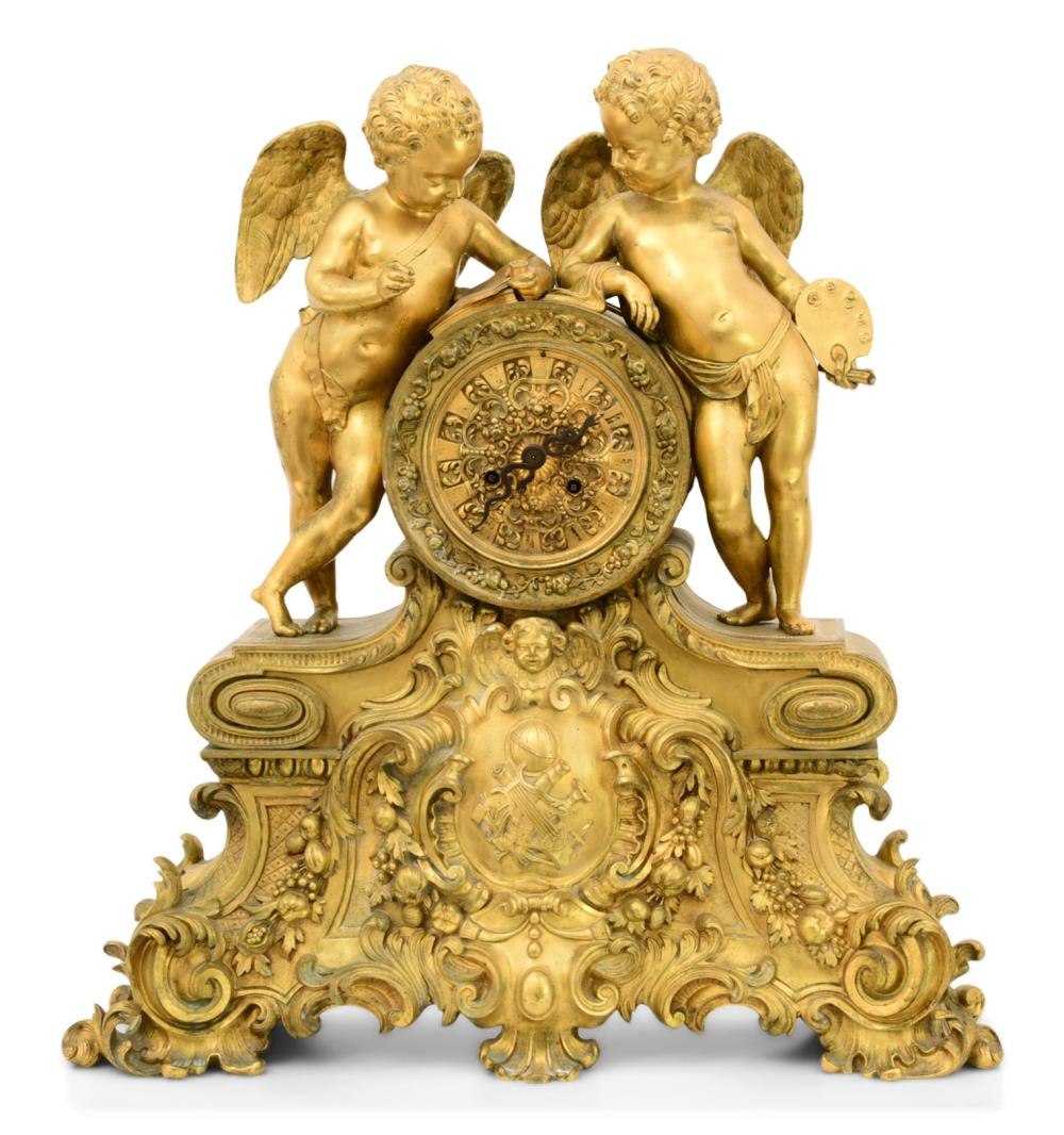 Front view of French Louis XV-style gilt bronze mantel clock