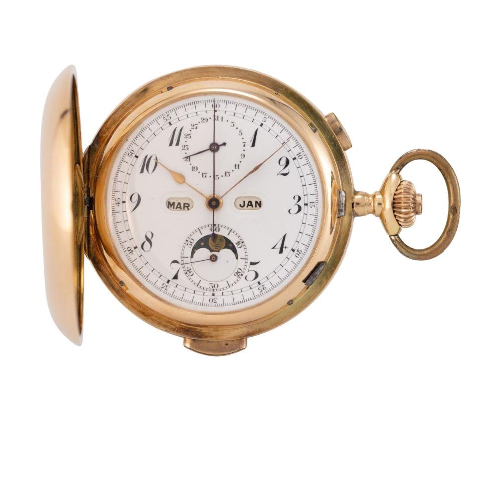 Front view of the open hunting case pocket watch showing dial, calendar windows, and moon phase aperture