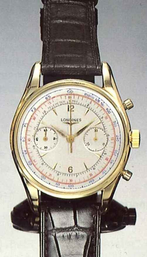 Front view of the 18 ct. gold Longines chronograph with dual sub-registers and concentric tachymeter/telemeter scales.