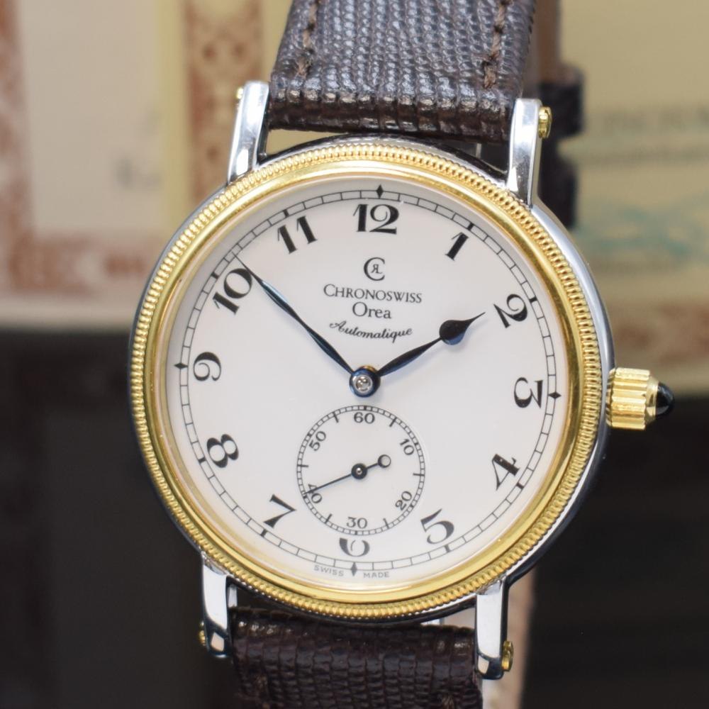 Front view of the Chronoswiss Orea watch showing the Arabic numerals, enamel dial, and original strap.