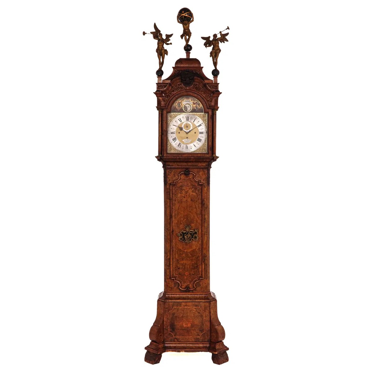 Full front view of the burr walnut veneered longcase clock with carved figures atop the hood