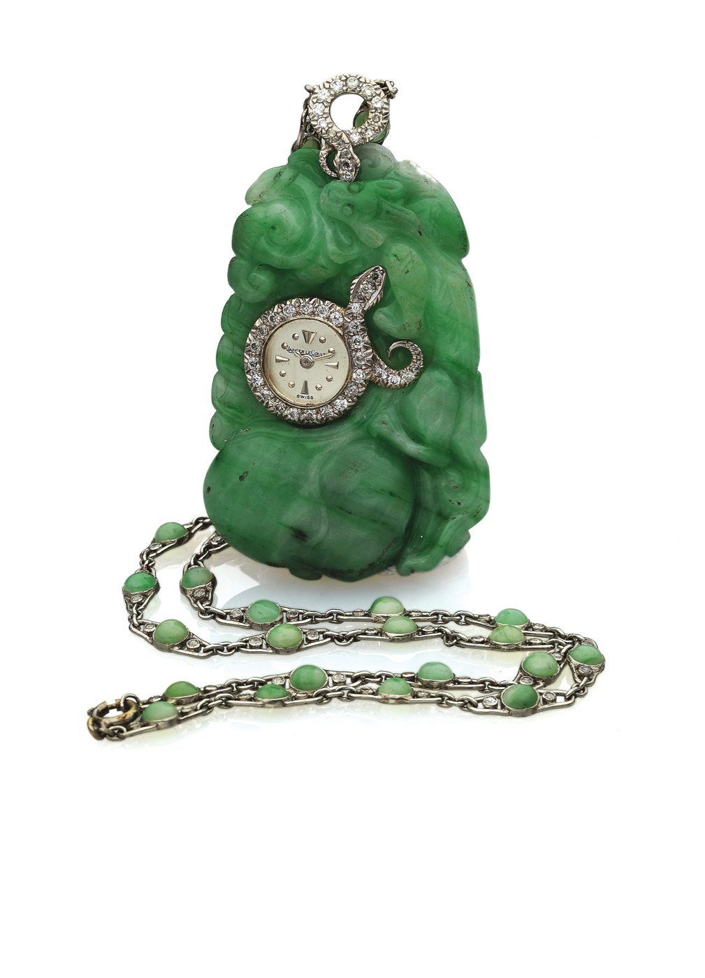 The Jaeger-LeCoultre pendant watch featuring a carved green jade housing and a diamond-set serpent motif, with its matching chain.