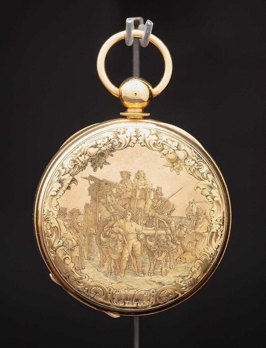 Montre en or ronde gravée (MIH I-171)