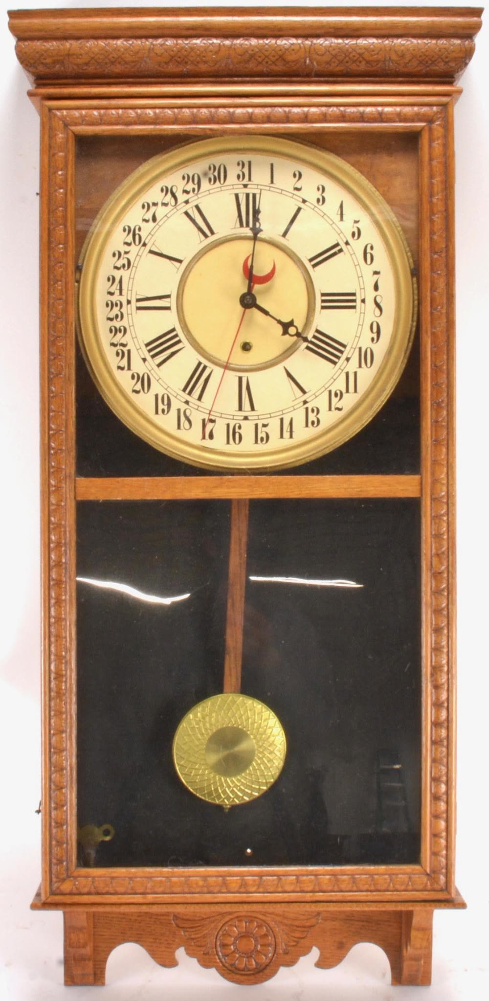 Sessions Welch Store Regulator E wall calendar clock in an American oak case