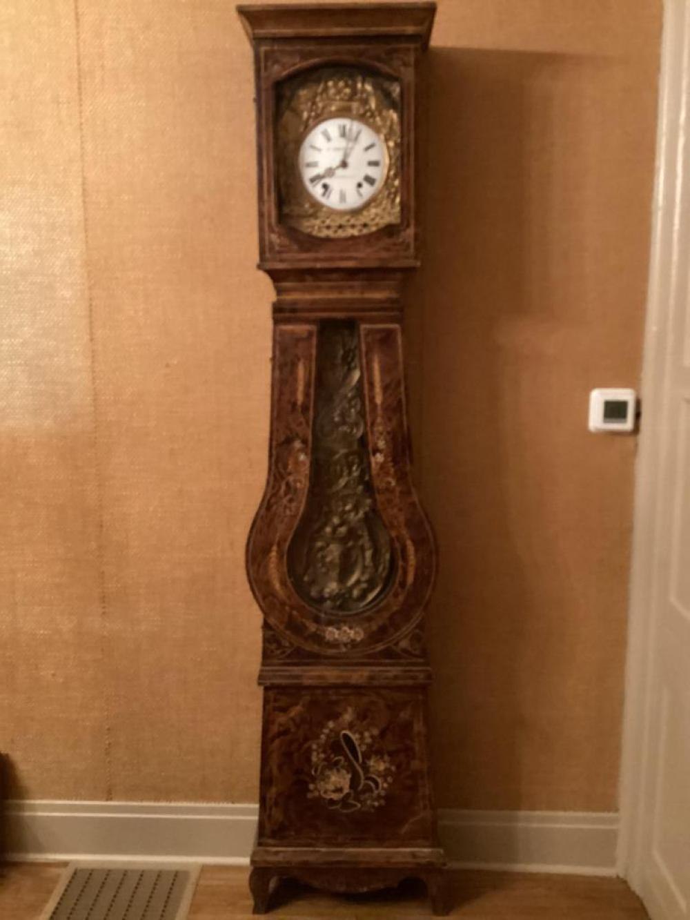Full view of the Morbier tall case clock.