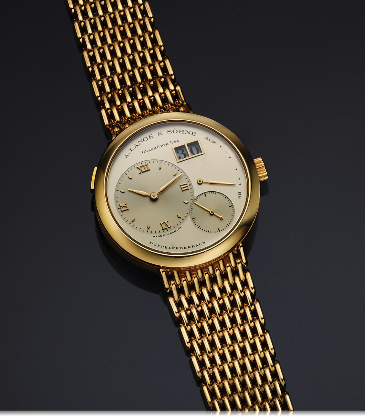 A. Lange & Söhne Lange 1 in 18K yellow gold with its integrated link bracelet.
