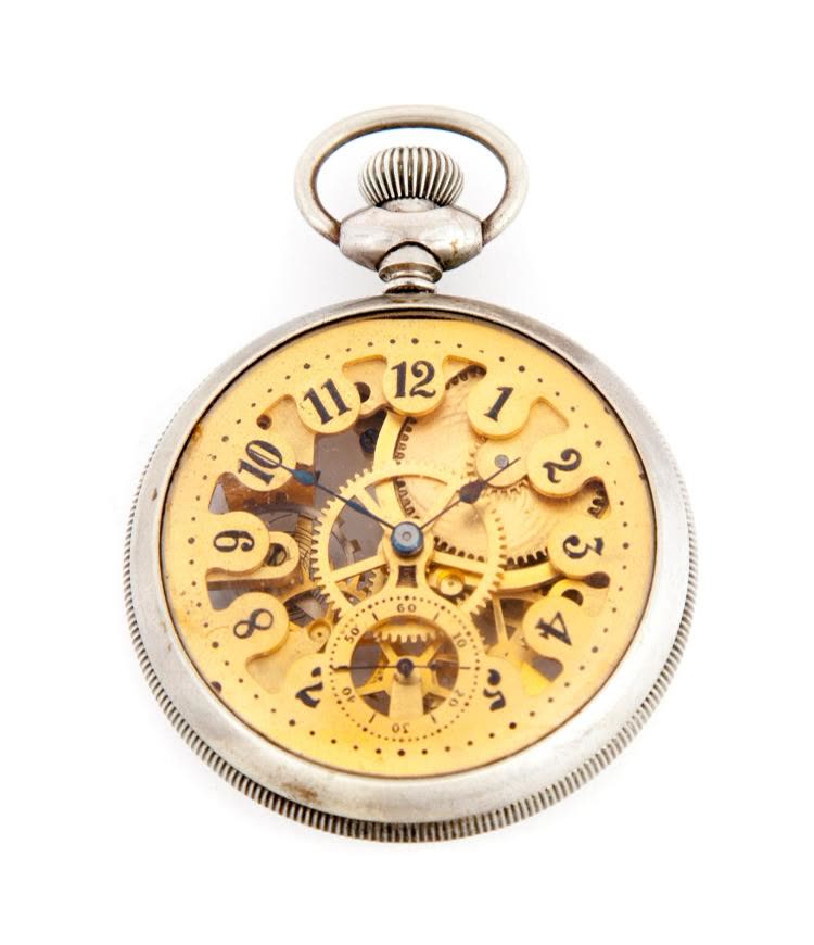 Front view of New England Watch Co. skeleton pocket watch showing the openwork gilt dial and exposed movement gears