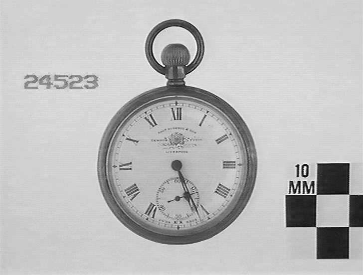 Front view of the pocket watch showing the enamel dial with Roman numerals and the 'Tempus Fugit' inscription.