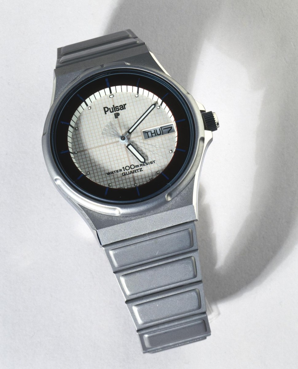 Front view of the Pulsar Quartz solar-powered analogue wristwatch with integrated bracelet