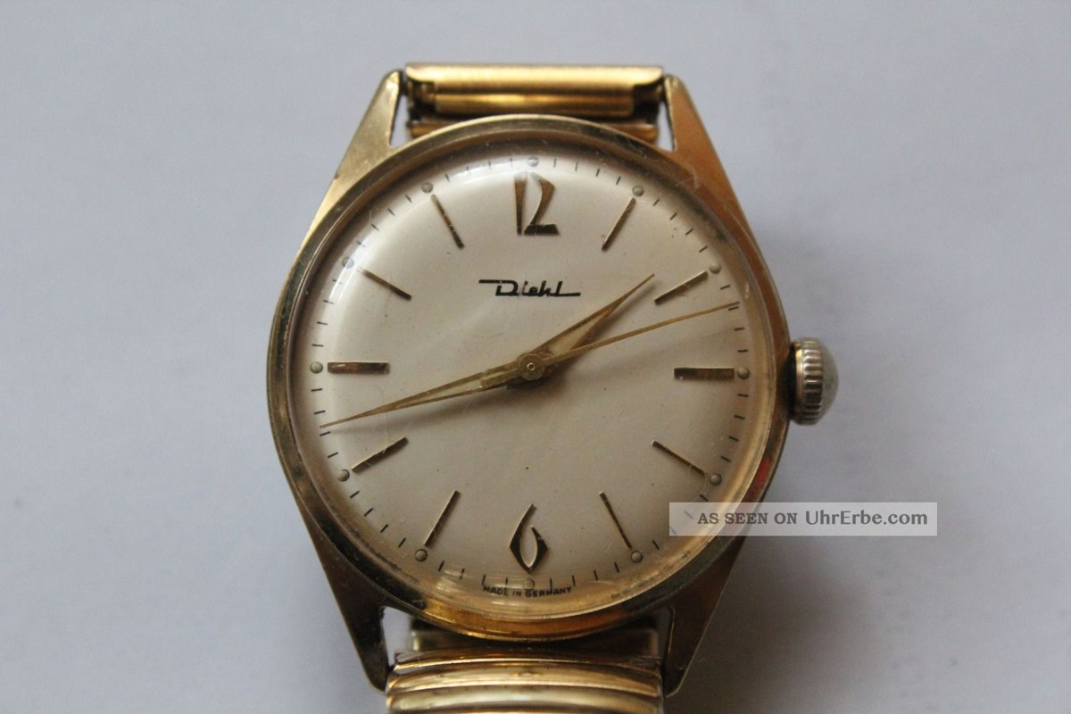 Front view of the Diehl manual-wind wristwatch dial and gold-toned case on bracelet