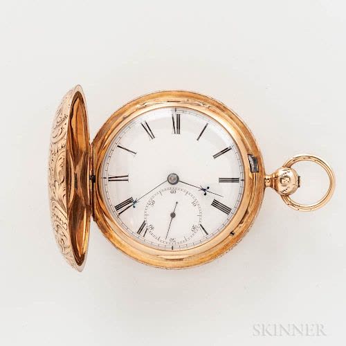 Front view of open hunter-case pocket watch showing white enamel dial and engraved gold case