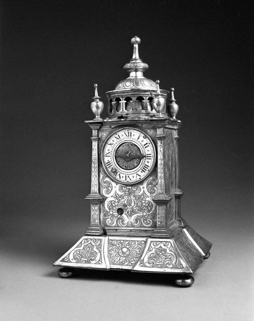 Frontal view of the German tabernacle clock in copper gilt and gilt brass, accession M.16-1940, at The Fitzwilliam Museum.