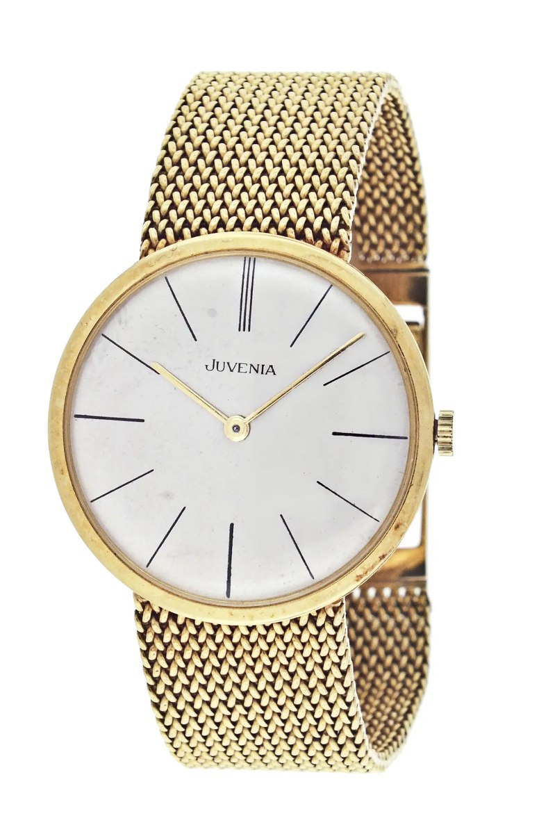 Front view of Juvenia gold wristwatch showing dial, hands, and woven mesh bracelet