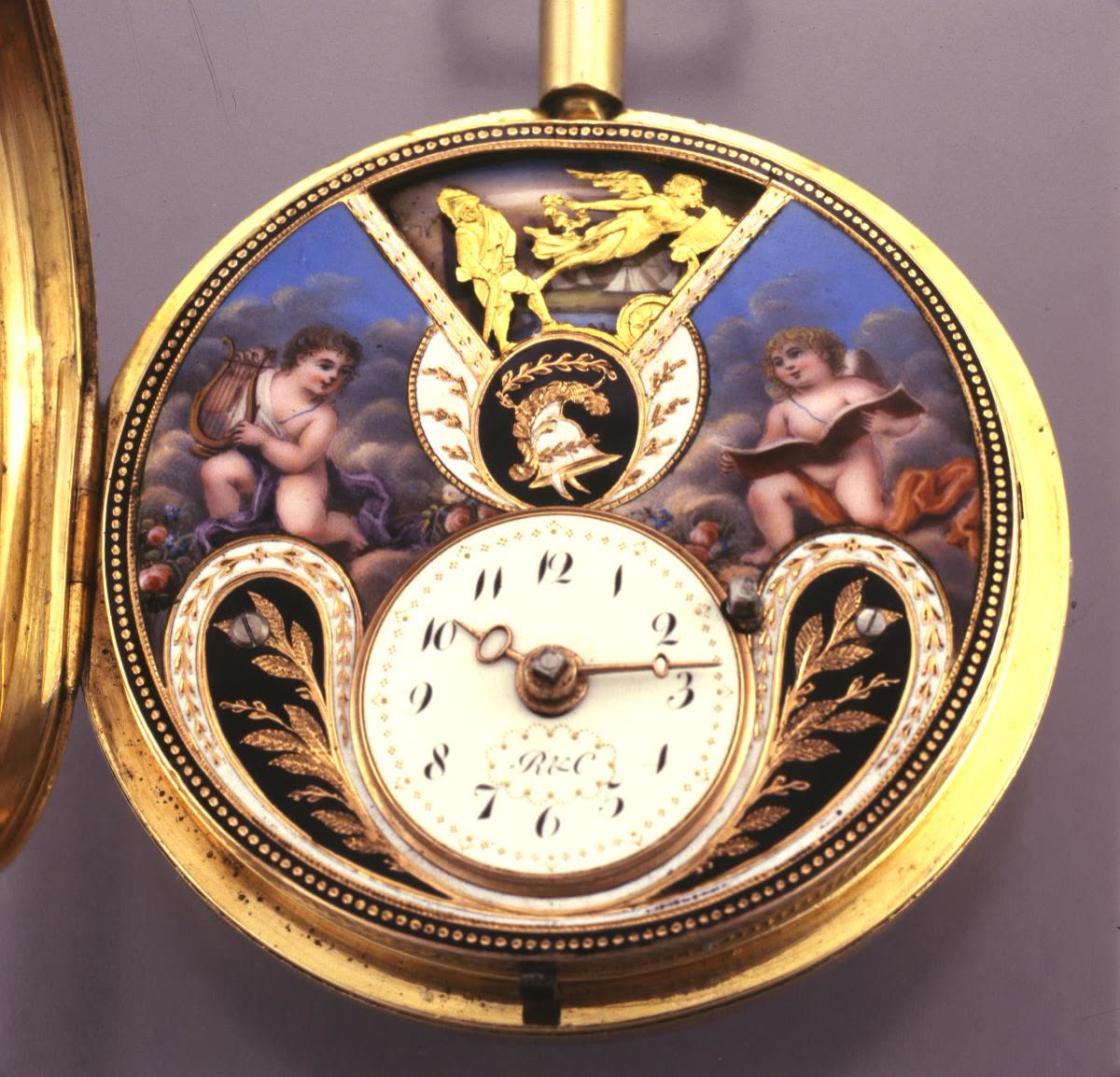 The case is polished gold (MIH I-1123)