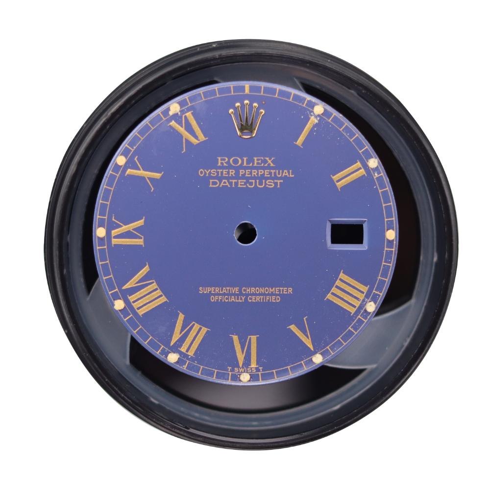 Front view of blue Rolex Buckley Datejust dial in protective carrier