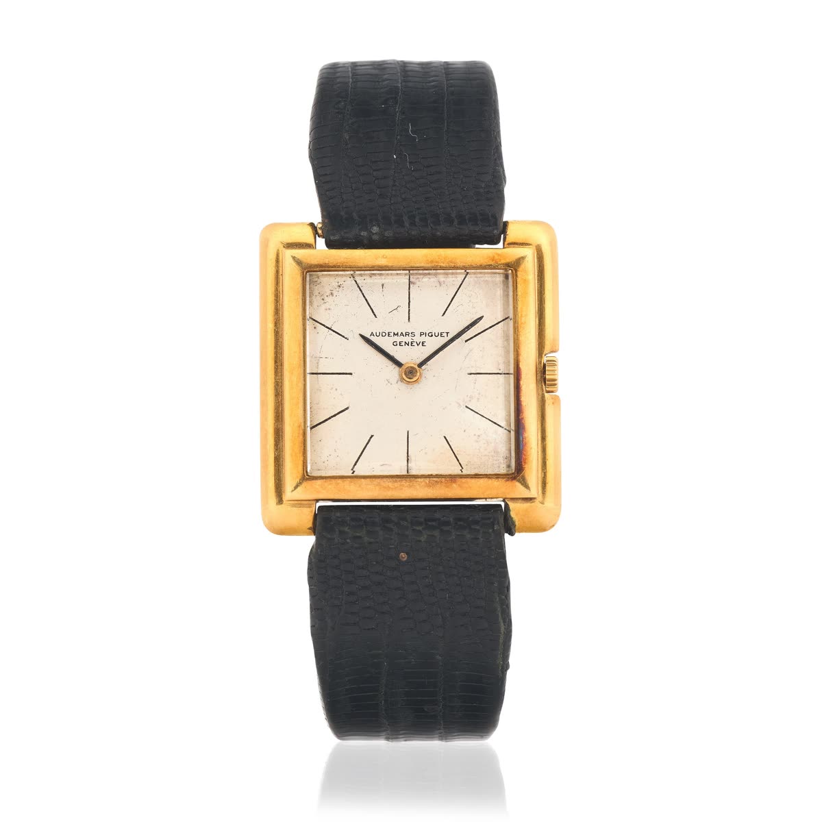 Front view of an 18K gold square Audemars Piguet manual wind wristwatch with silvered baton dial